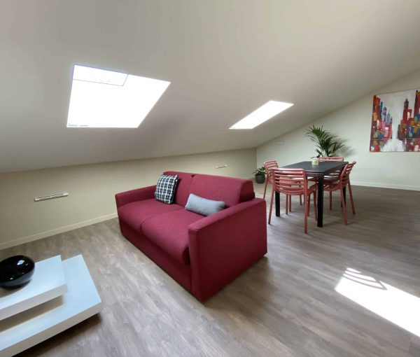 Logement 9 Foch : pièce de vie